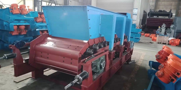 技術交流—中型板式喂料機結構改造