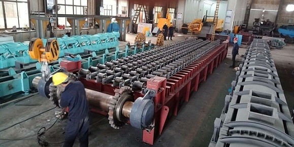  新型抗磨損板式給料機(jī)滾輪裝置